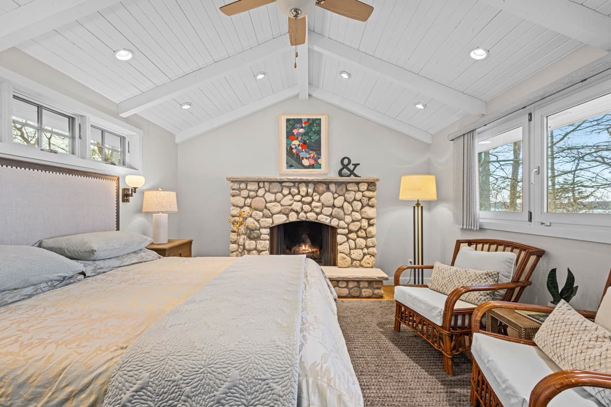 Cottage Bedroom with Stone Fireplace