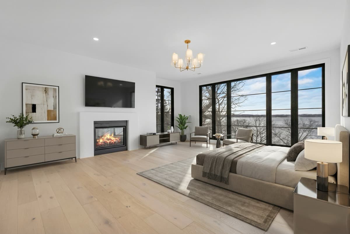 Staged master bedroom with lake view