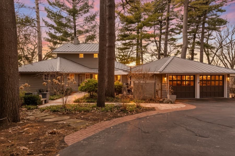 Twilight wooded estate exterior